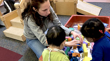 ECS student working with young children