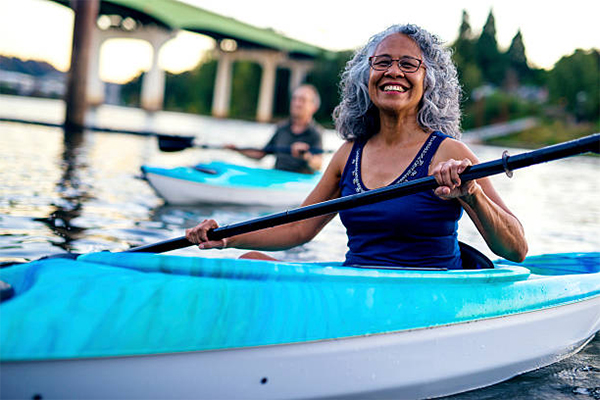 HDFS- Aging/Gerontology photo, woman paddling kayak